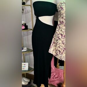 Black cutout dress, asymmetrical, and fitted, New with tags size medium